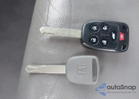 2012 Honda Odyssey Ex-L z USA, uszkodzony, nr VIN 5FNRL5H66CB093777